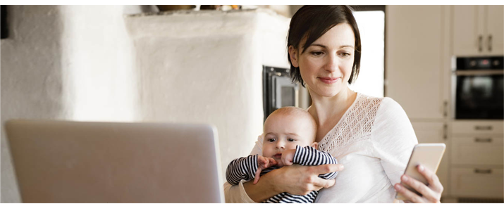 A mom transacting from home over mobile and Web